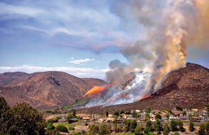 Firefighters actively working to put out a fire in California.