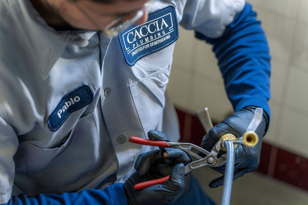 Close up of Pablo from Caccia Home Services working at a residence