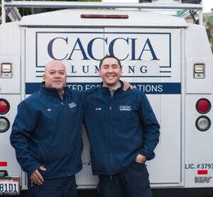 caccia plumbers in front of a caccia plumbing service truck