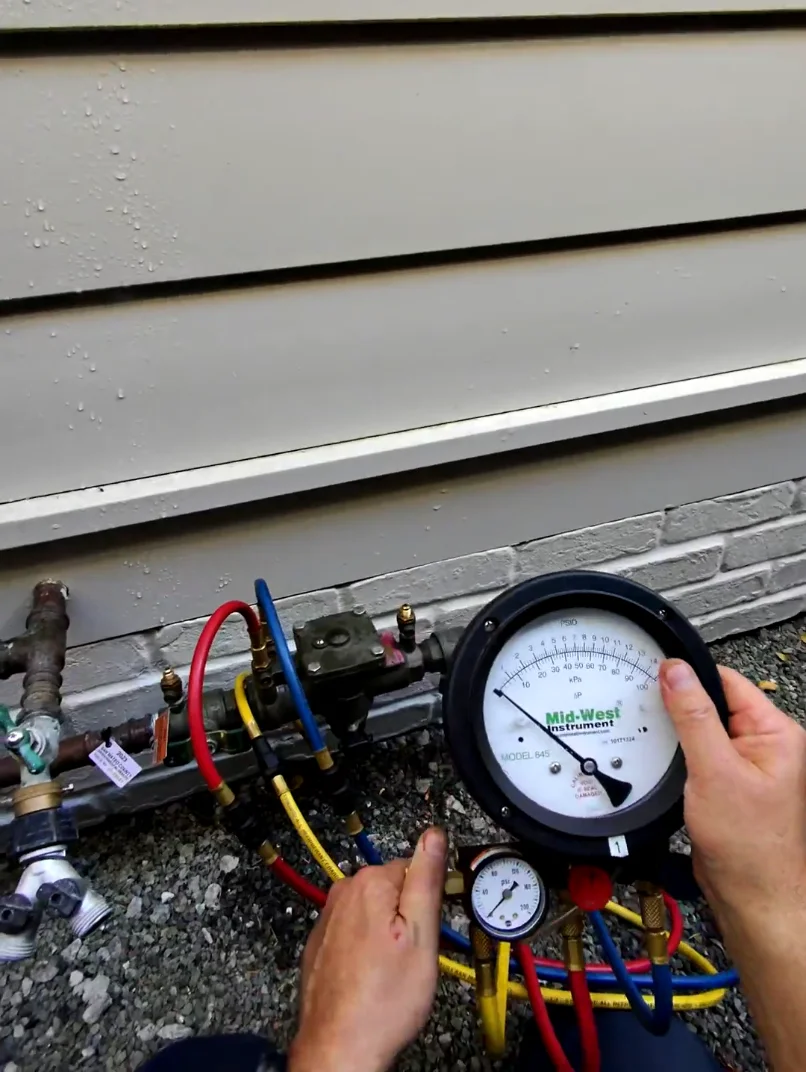 Midwest Model 845 test kit hoses connected to the assembly’s test cocks