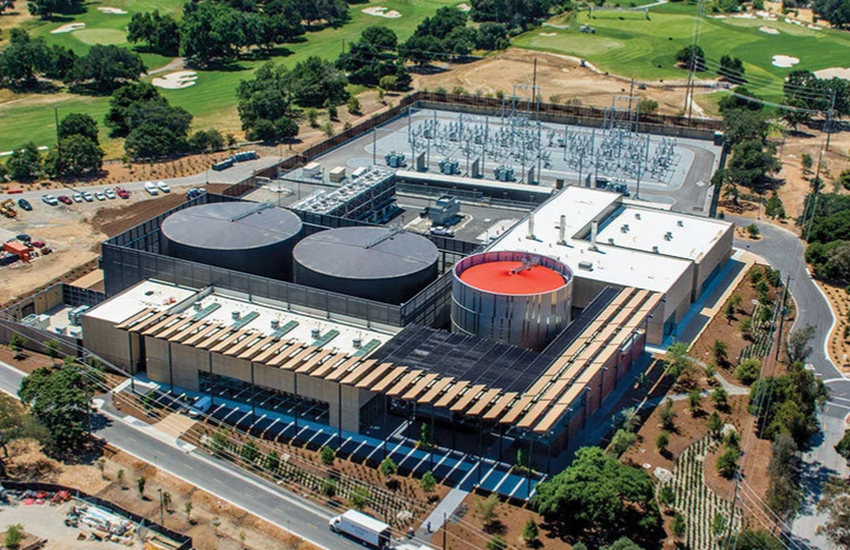 Aerial shot of Stanford's Central Energy Facility (CEF), including twin cold water tanks and a separate hot water tank.