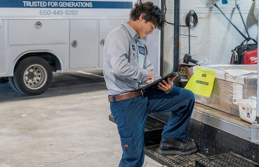 A Caccia Home Services employee gets ready to go out on a call