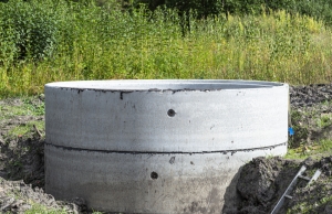 Side view of a concrete septic tank
