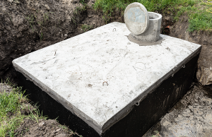 A newly-installed septic tank in a customer's yard
