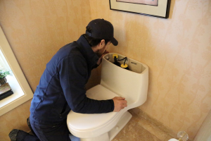 Dino from Caccia Home Services diagnoses noisy flushing